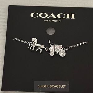 Coach silver horse and carriage slider bracelet